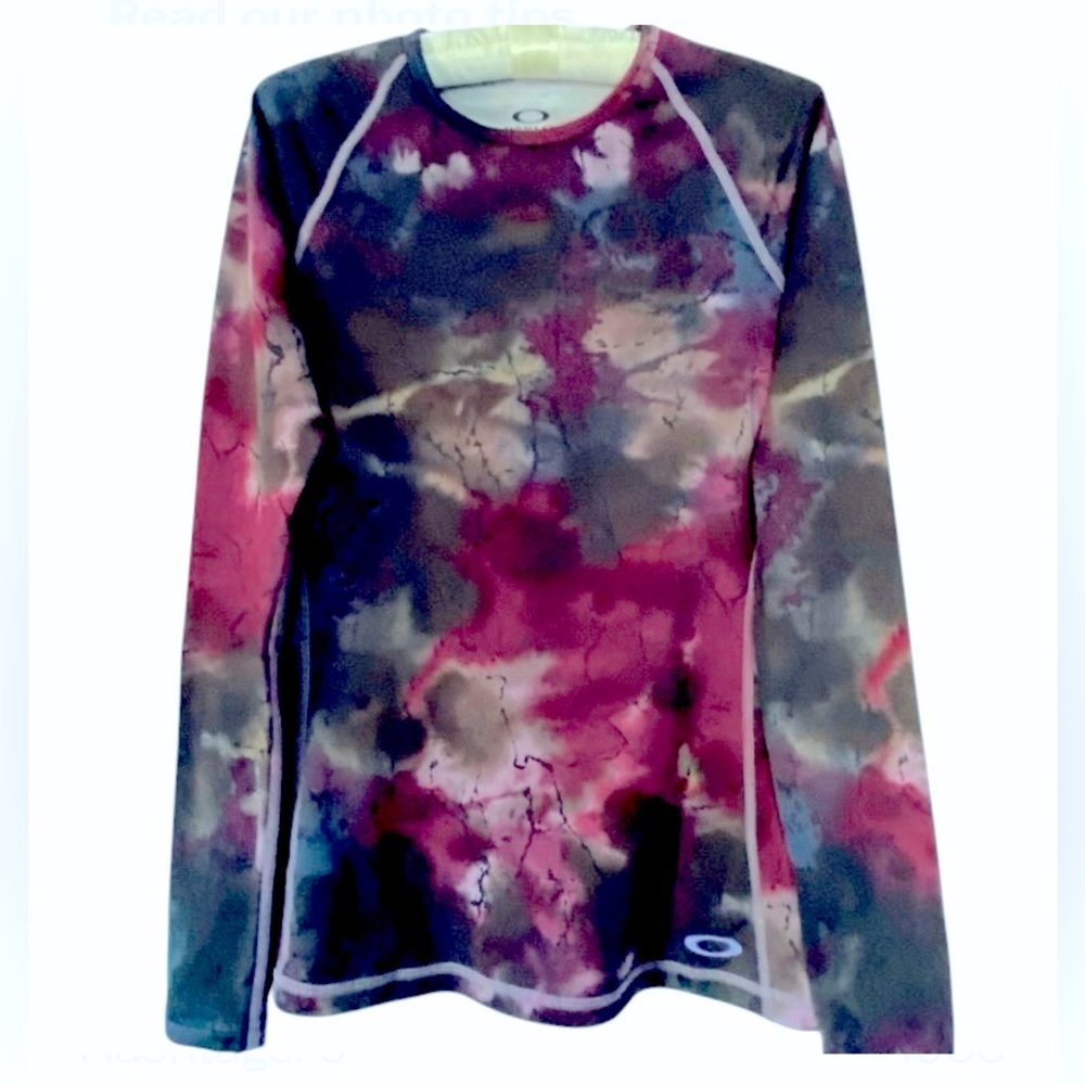 Oakley multi colored long sleeve sports top. Size S